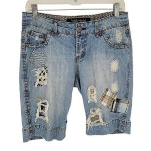 Something Trickie Juniors 7 distressed plaid Patchwork medium wash blue shorts